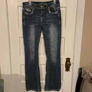 Grace in LA size 28. Bootcut with no wear on hem at all. Embellished pockets